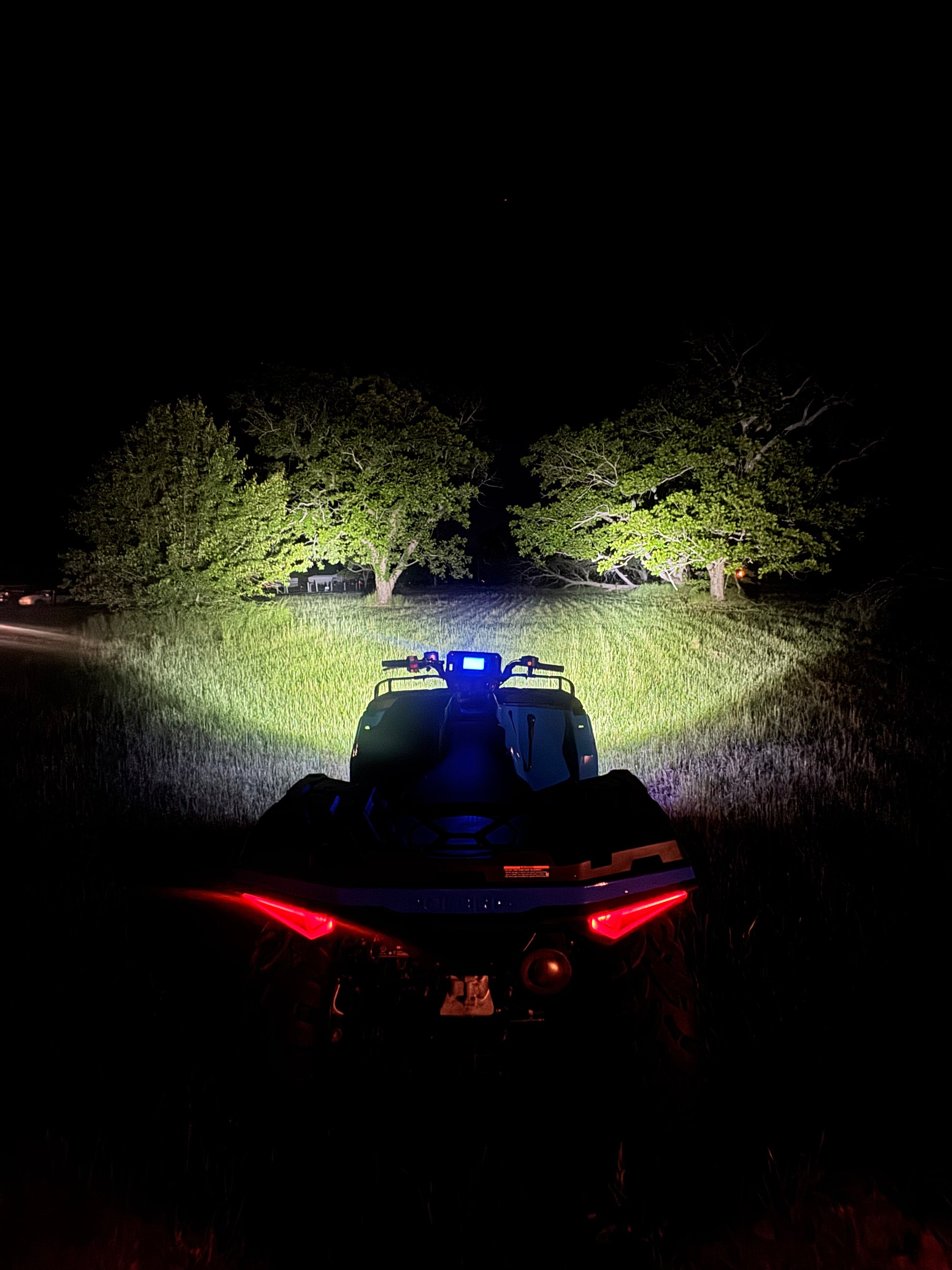 Ultra-bright 3x3 LED spotlight cube on custom Polaris Sportsman headlight
