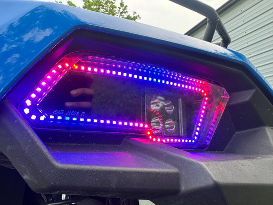 Detailed view of RGBW chasing halo ring on ATV headlight housing