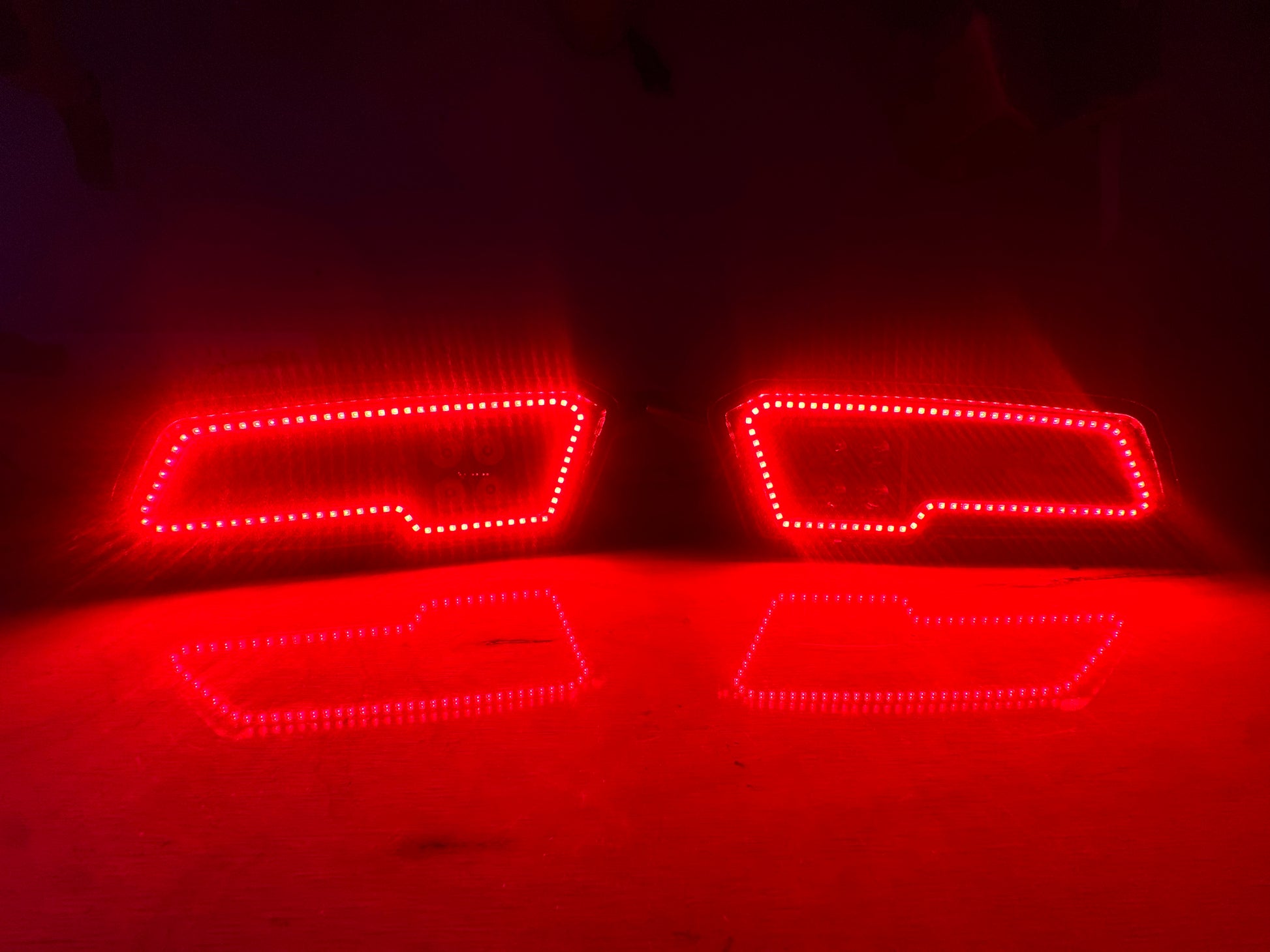 Custom-built Polaris Sportsman LED headlights with RGBW halos by Black Ridge Lighting